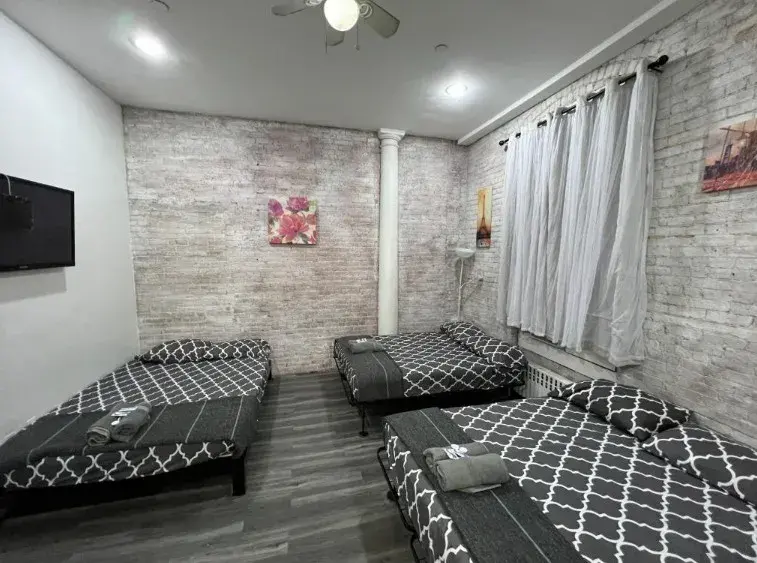 Deluxe Family Room con tres camas dobles